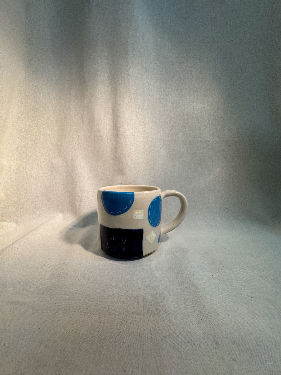Handmade patchwork ceramic mug