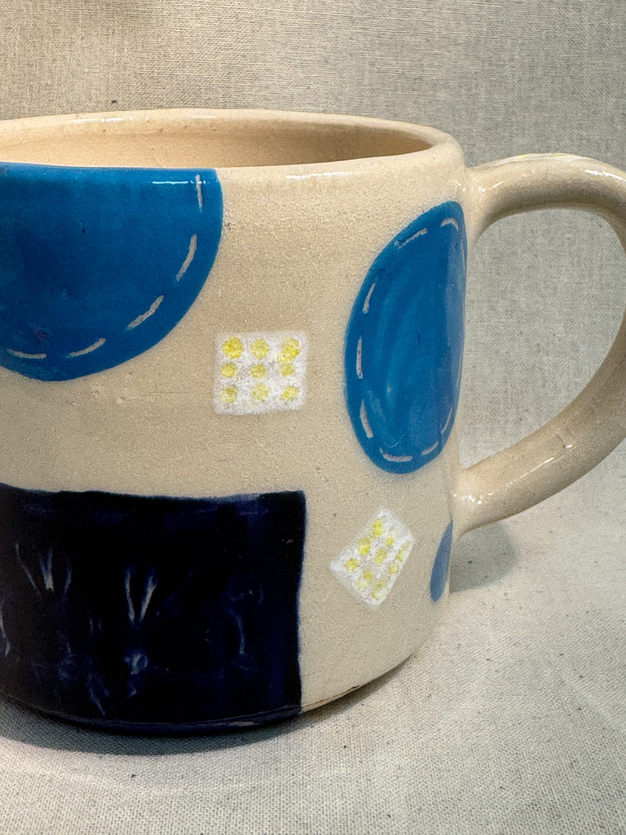 Handmade patchwork ceramic mug
