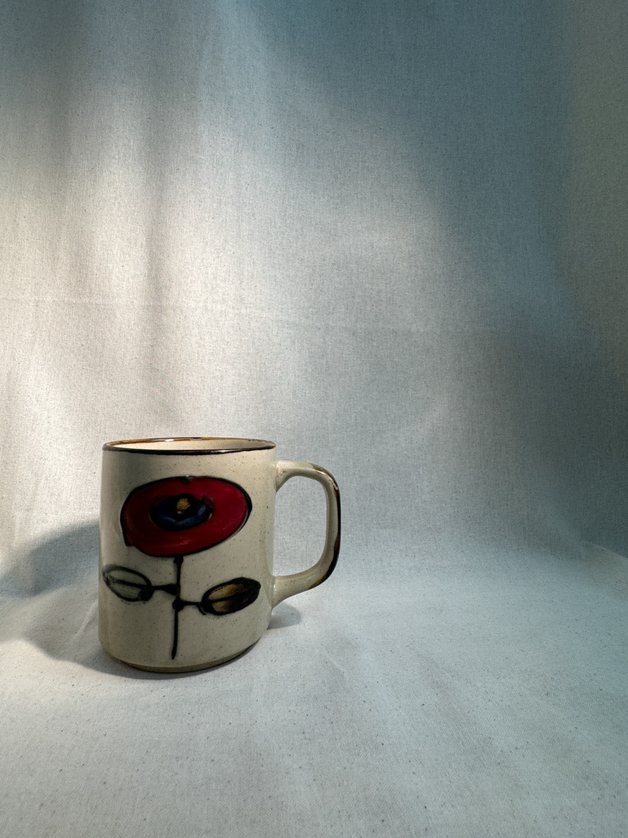 Vintage mug with flower design