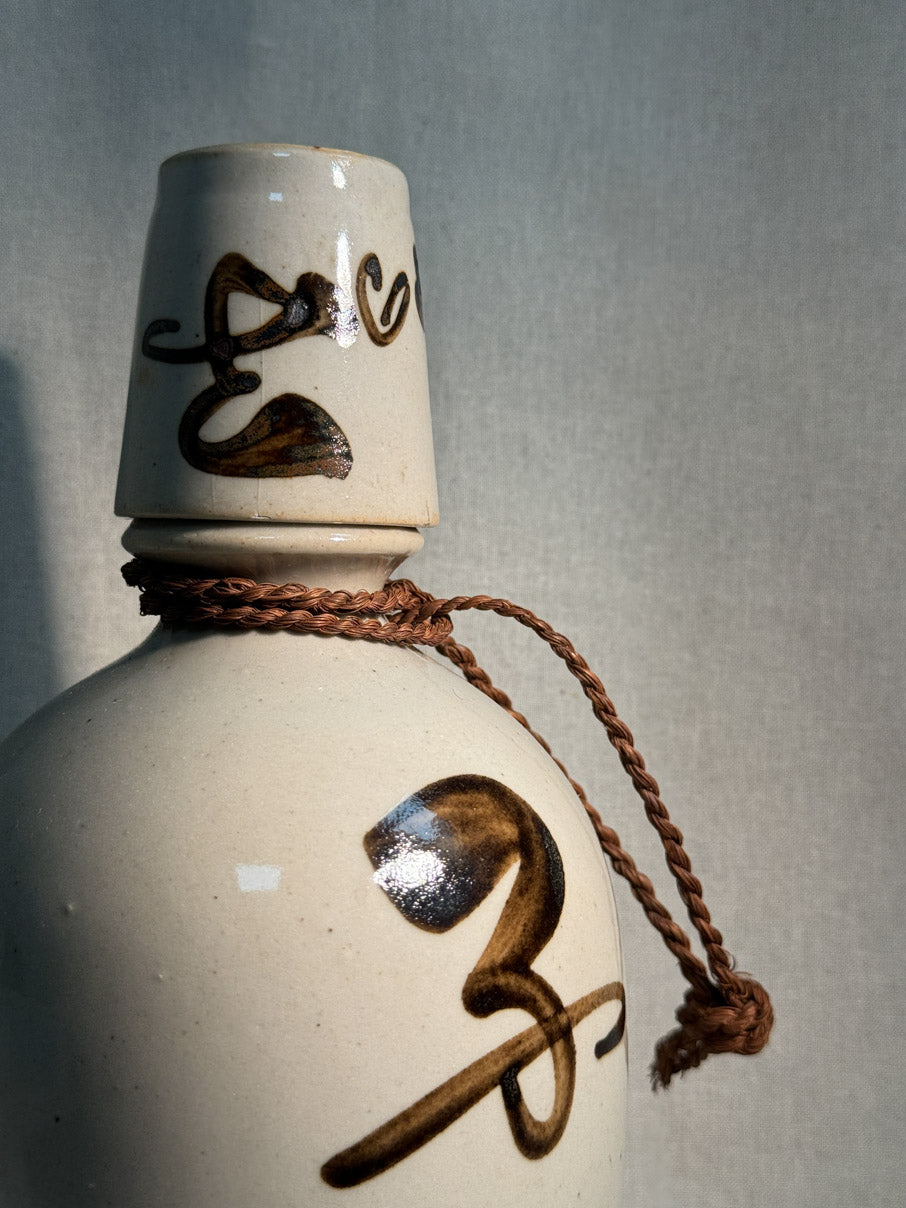 Ceramic sake jug and cup