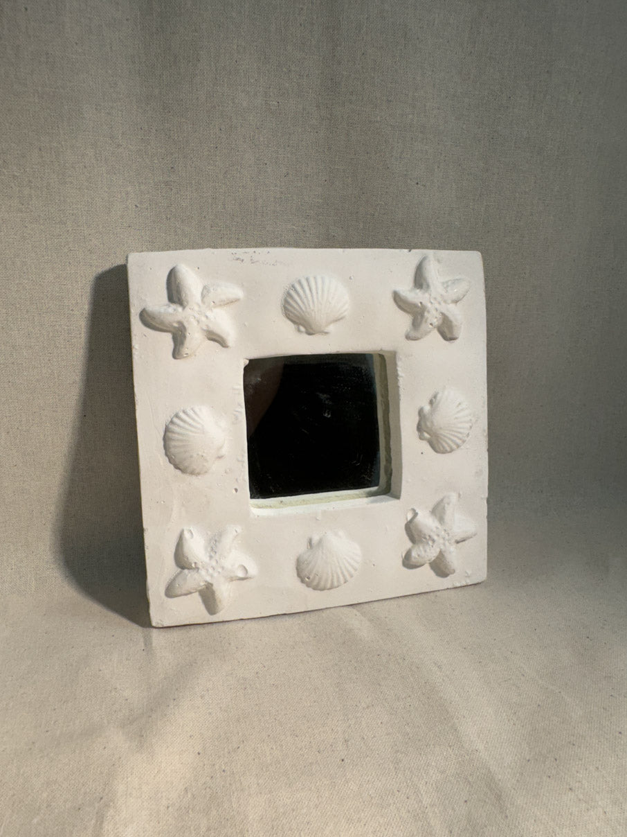 Plaster shell mirror