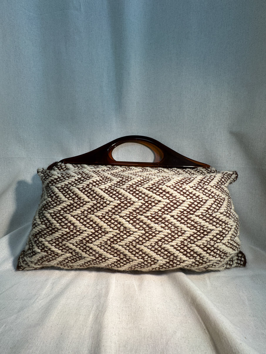 Knit bag with acrylic handles