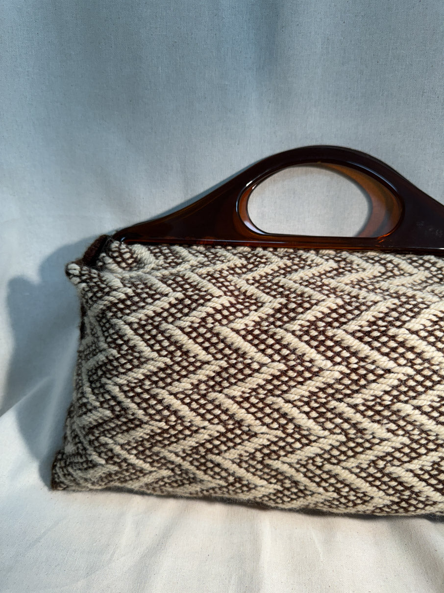 Knit bag with acrylic handles