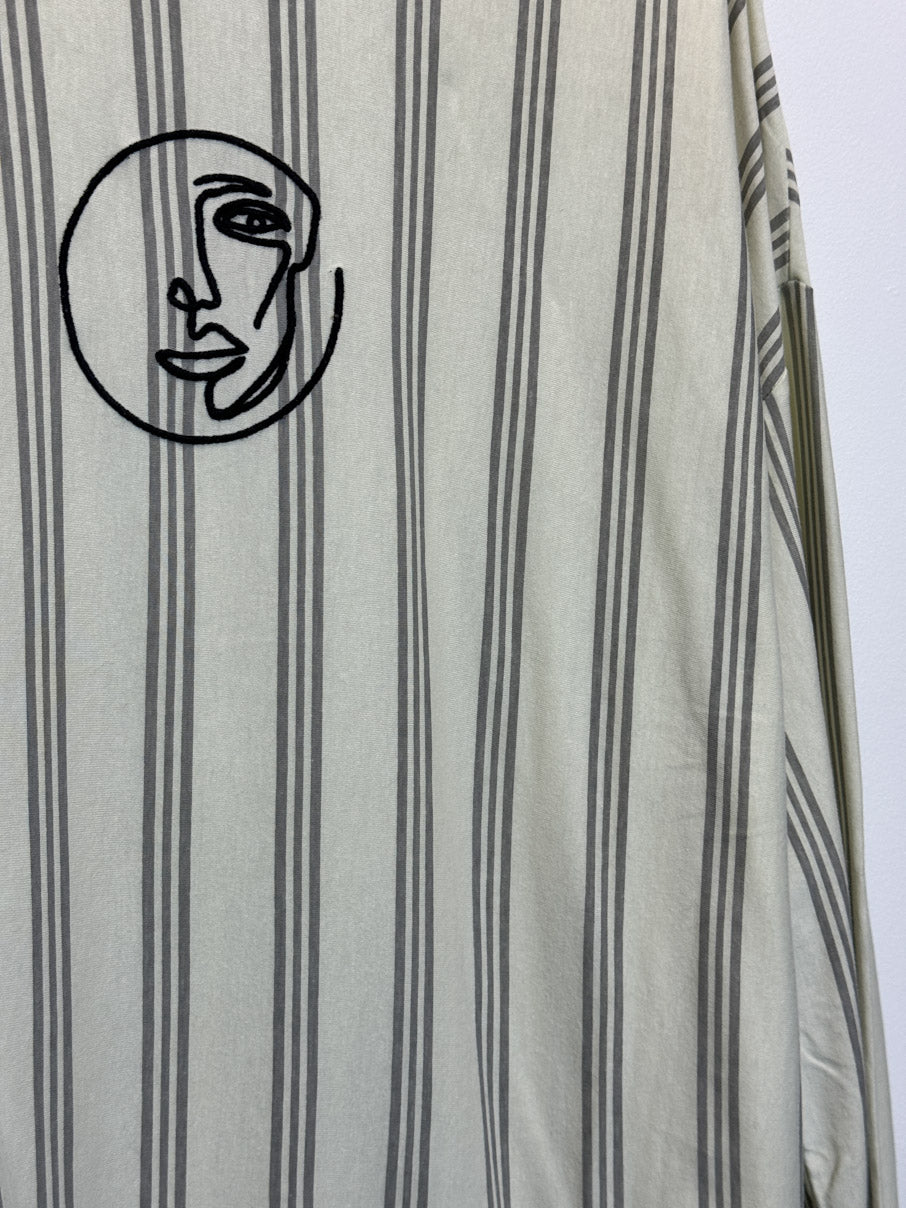 Striped long sleeve tshirt with abstract face (L)