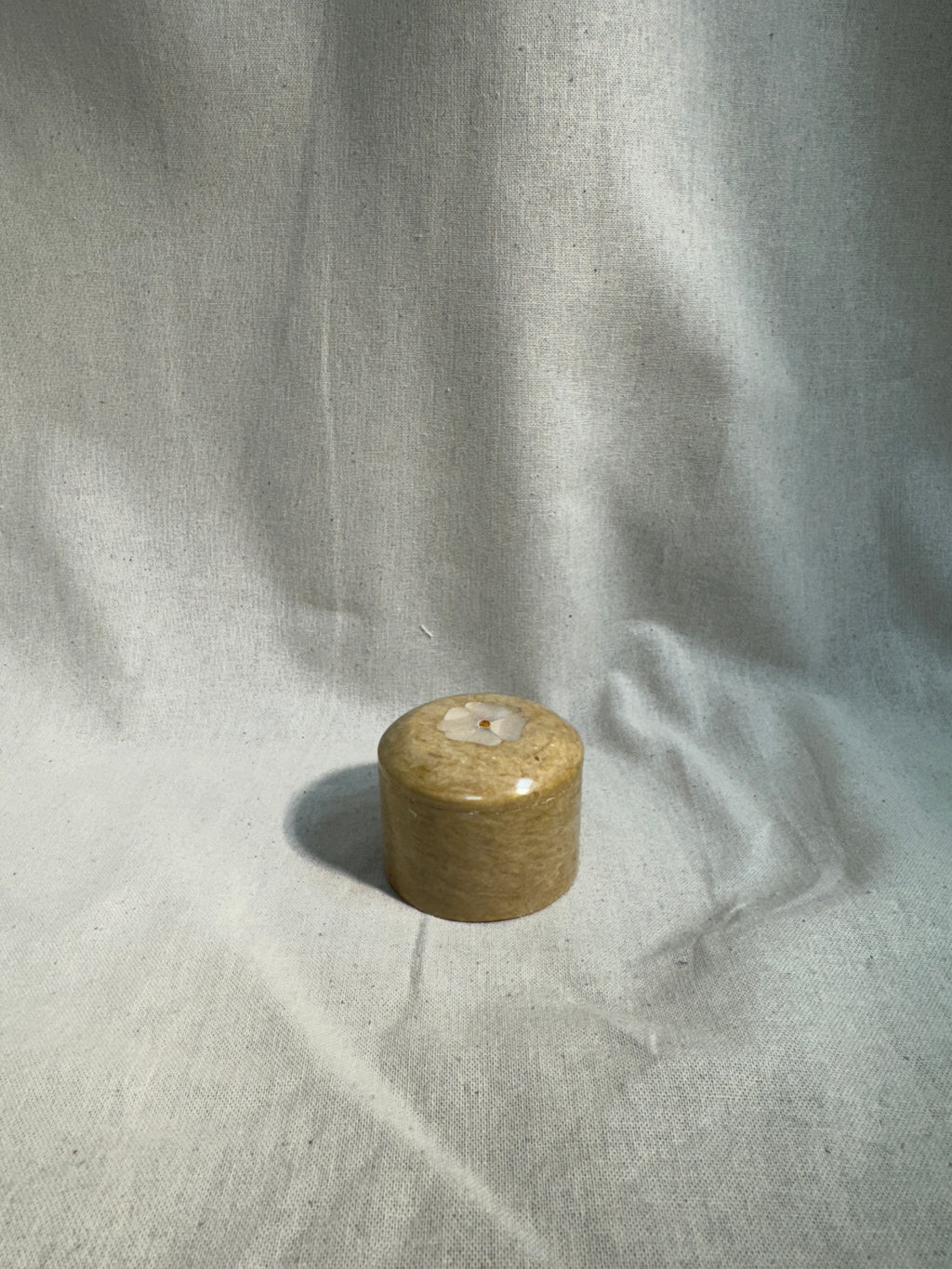 Stone pill box with flower inlay