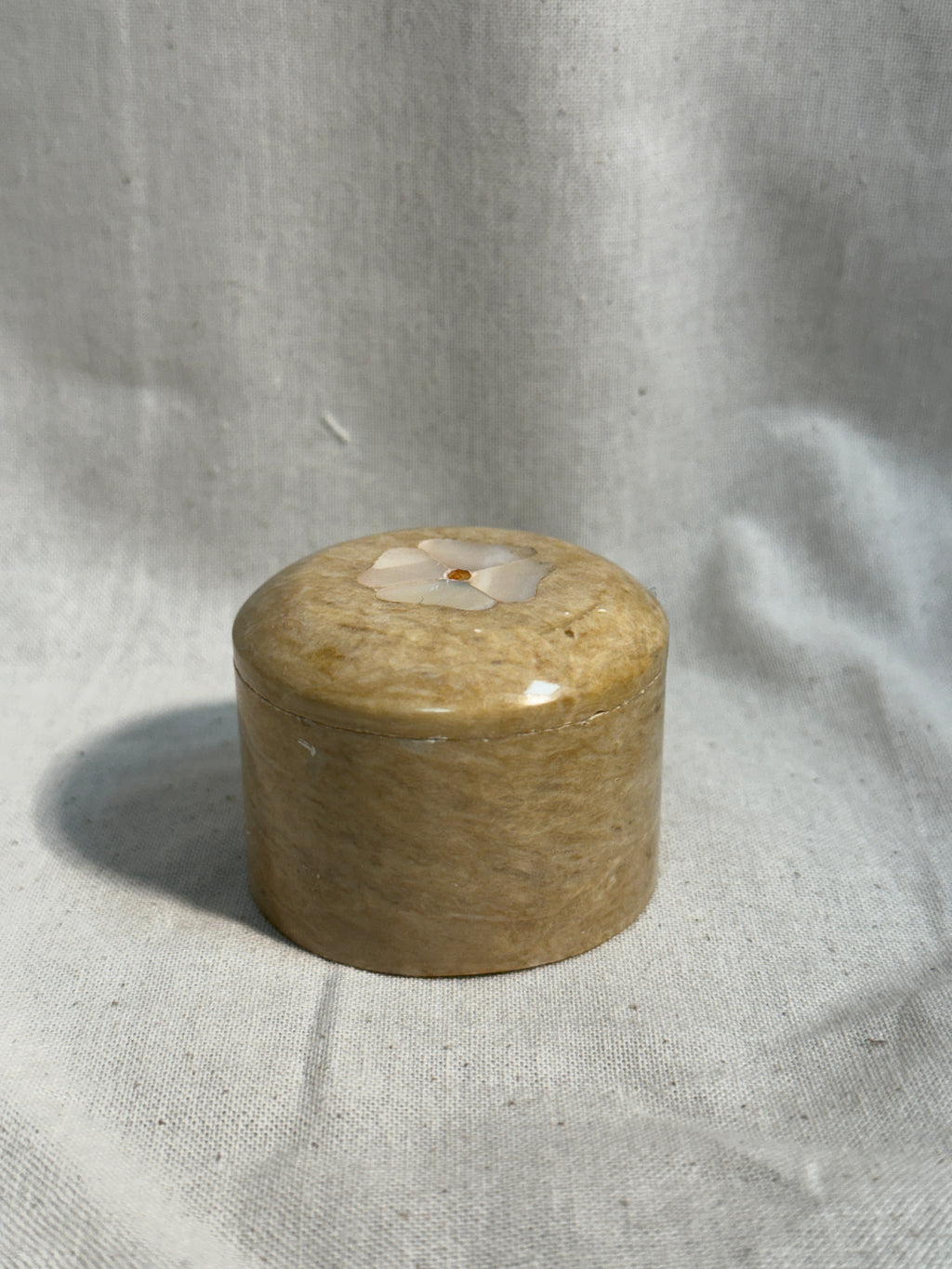 Stone pill box with flower inlay