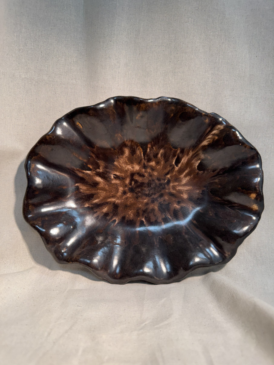 Handmade scalloped pottery dish