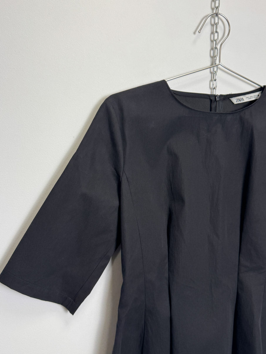 Structured peplum top (M)