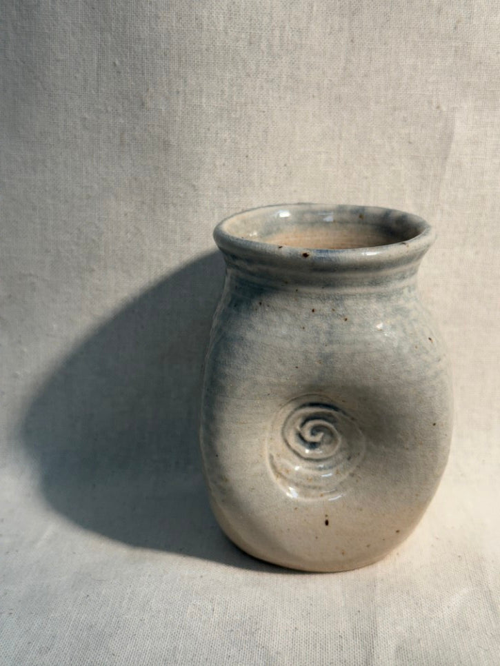 Tiny swirl marked pot