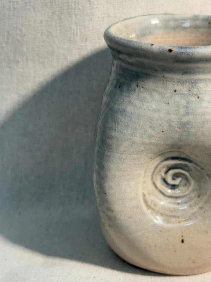Tiny swirl marked pot