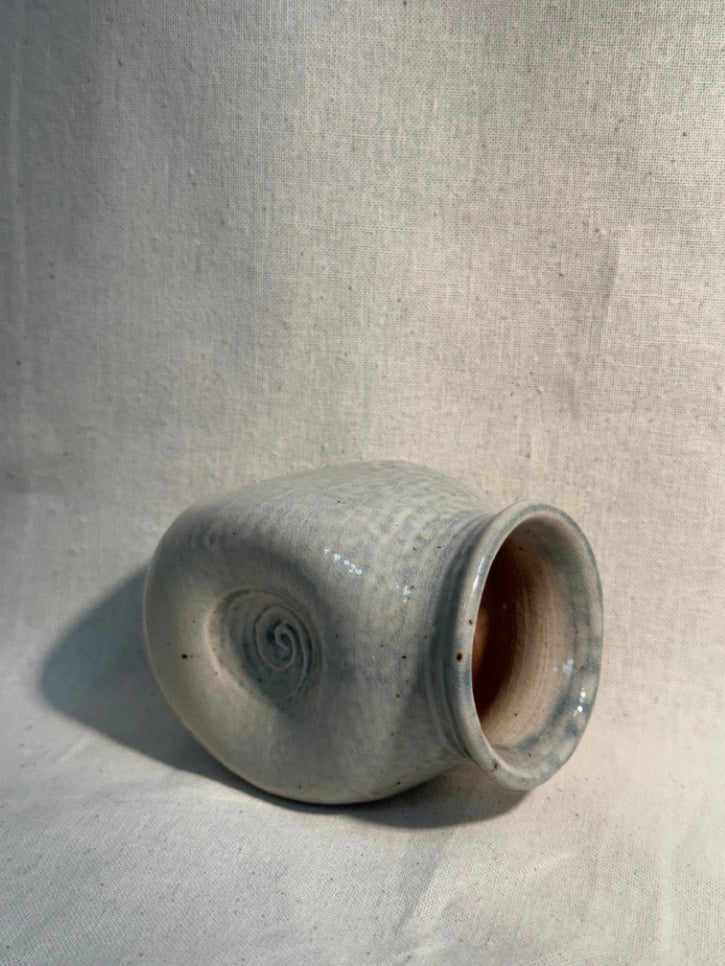 Tiny swirl marked pot