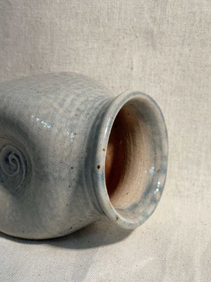 Tiny swirl marked pot