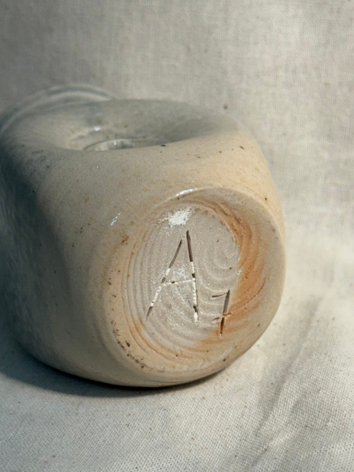 Tiny swirl marked pot